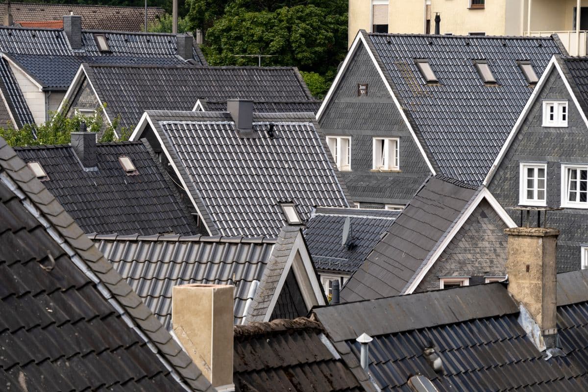 Aerial view of dark modern residential rooftops